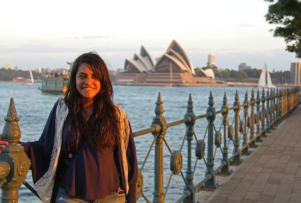 Roops stands in front of Sydney&#039;s iconic Opera House.